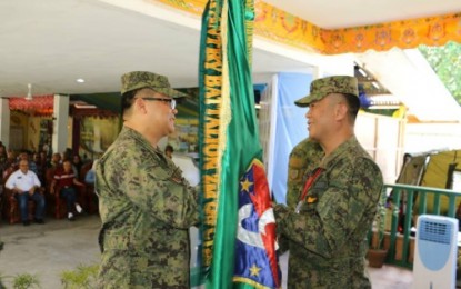<p><strong>TURNOVER.</strong> Brigadier General Cirilito Sobejana (right), 6th Infantry Division commander, talks briefly to Lieutenant Colonel Clairemont Pinpin, newly installed commander of 6th Infantry Battalion during the turnover of command Wednesday (June 27). <em><strong>(Photo by 6ID)</strong></em></p>